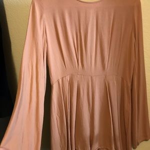 Beautiful long sleeve, short romper w/ open back